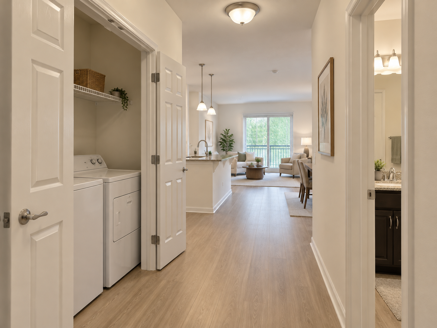 Commons Two Bedroom — hallway with laundry closet and bath