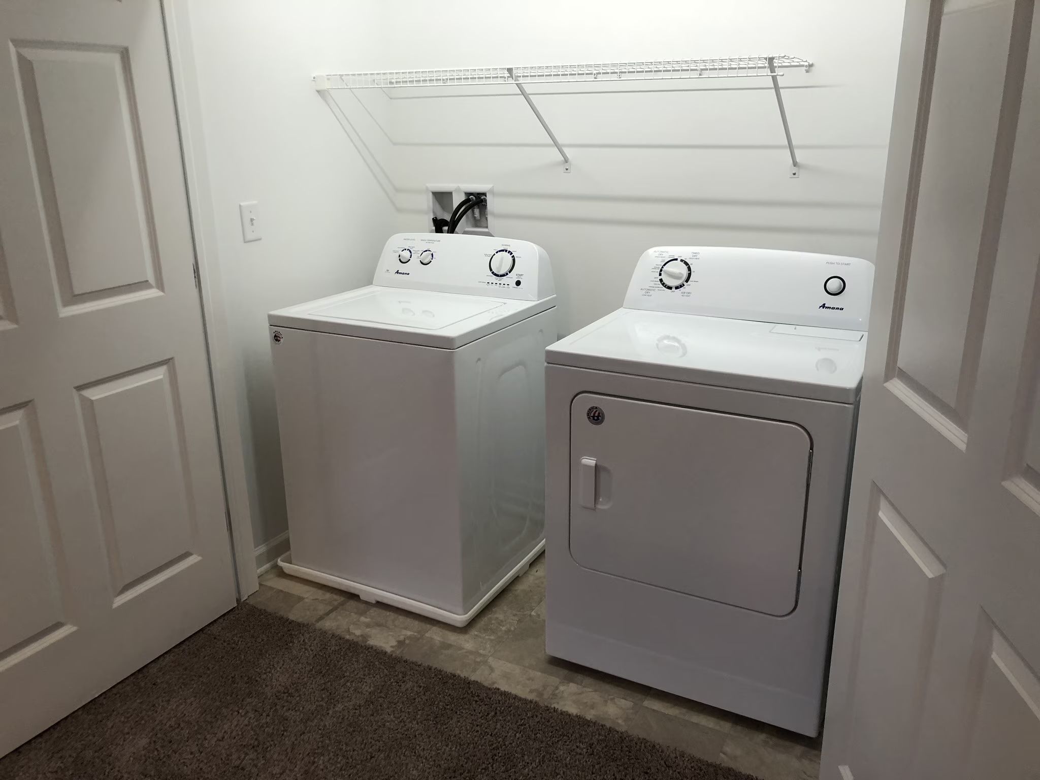 Laundry closet with full-size washer and dryer